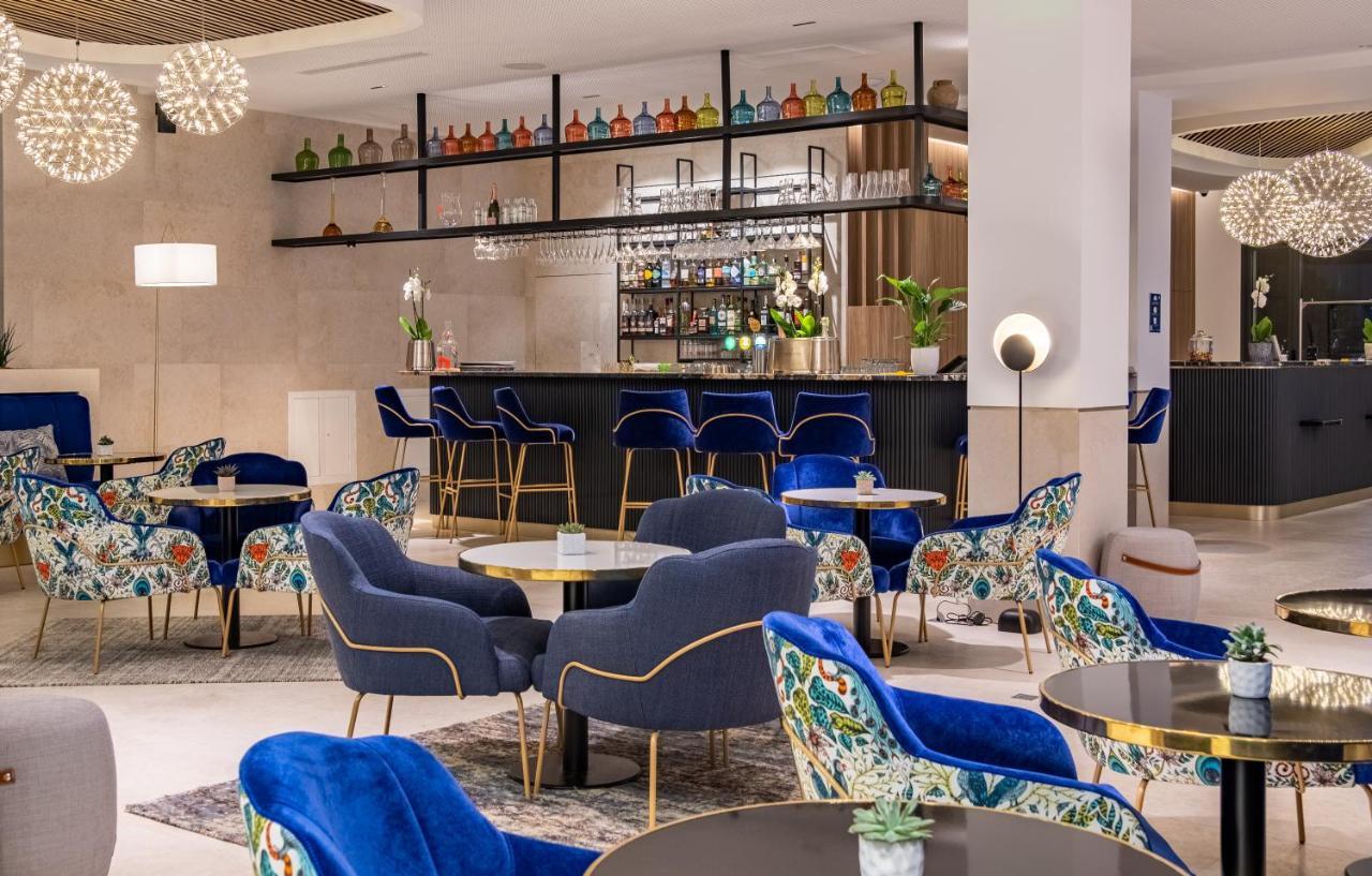 Golden Tulip Lyon Ouest Techlid Hotel & Spa ليمونيست المظهر الخارجي الصورة