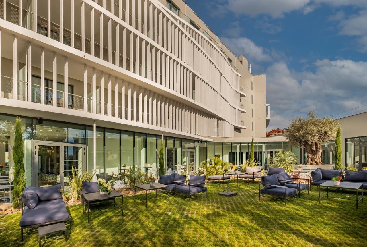 Golden Tulip Lyon Ouest Techlid Hotel & Spa ليمونيست المظهر الخارجي الصورة