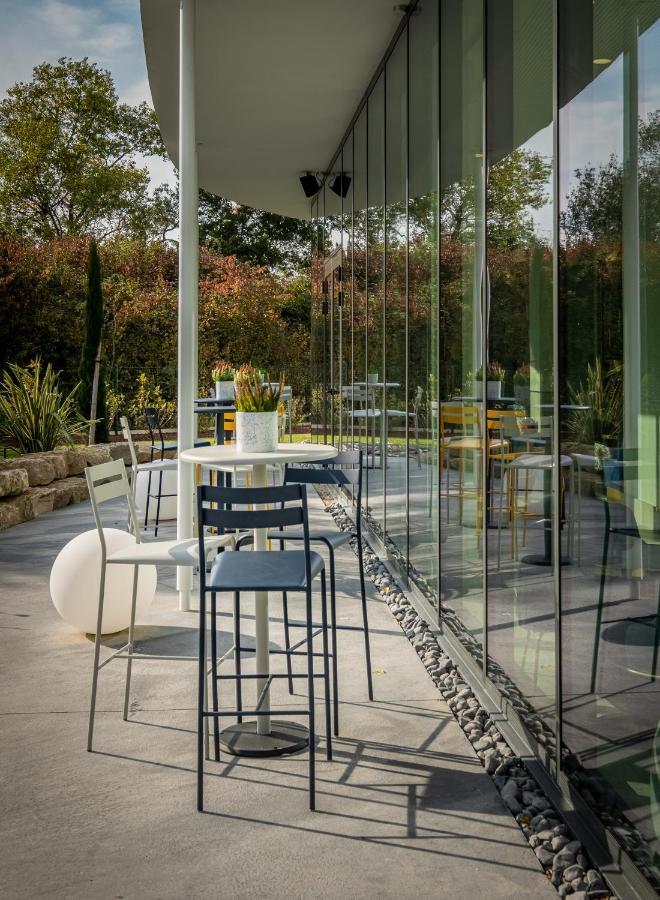 Golden Tulip Lyon Ouest Techlid Hotel & Spa ليمونيست المظهر الخارجي الصورة